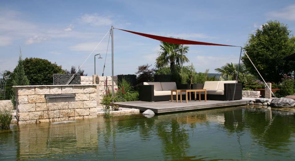 Schröer Garten- und Landschaftsbau zeigt einen Garten mit Schwimmteich
